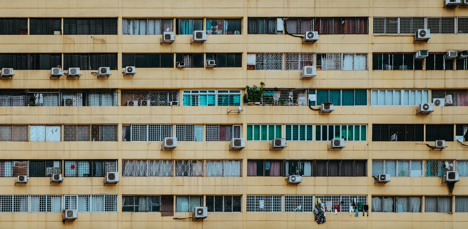 white home appliance hanging by building