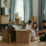 A family unpacks moving boxes in their new home kitchen, creating a cozy atmosphere.